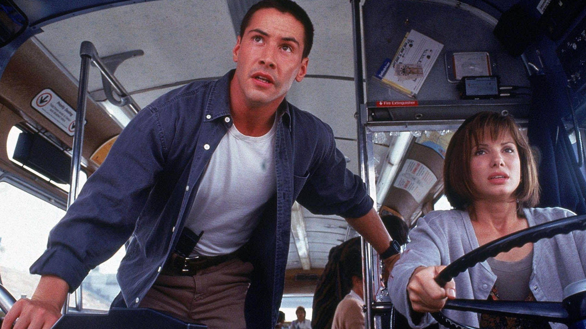 کیانو ریوز و ساندرا بولاک در یک اتوبوس در فیلم speed